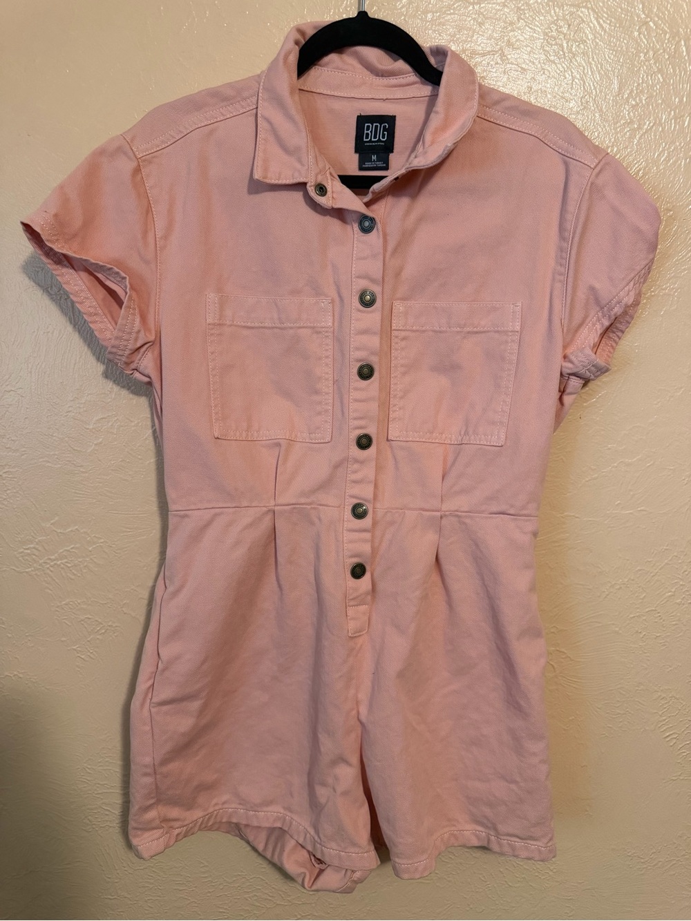 Pink denim romper